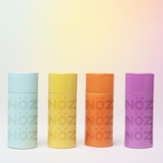 Load image into Gallery viewer, All four different color Noz stick sunscreen lined up right next to each other
