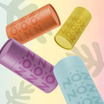 Load image into Gallery viewer, All four different colored stick Noz sunscreen posed in a titled position among each other
