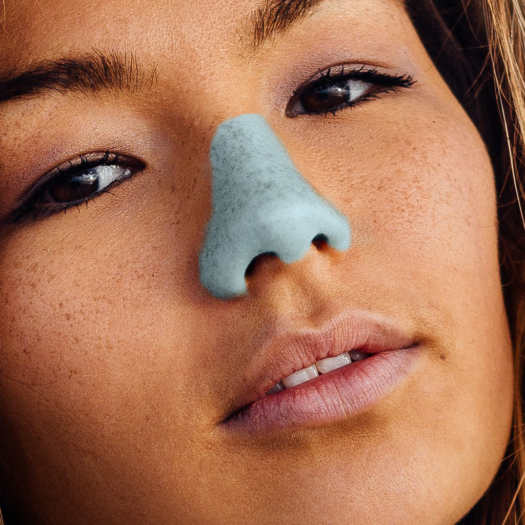 Young Lady posed in a shot with Noz sunscreen on her nose 